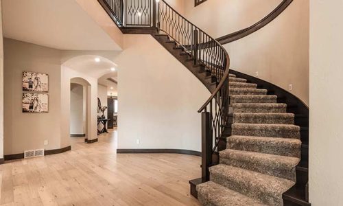 Winding staircase leading to upstairs area in North Dakota